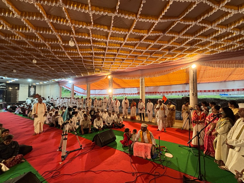 Devotees gathered under the festival pandal