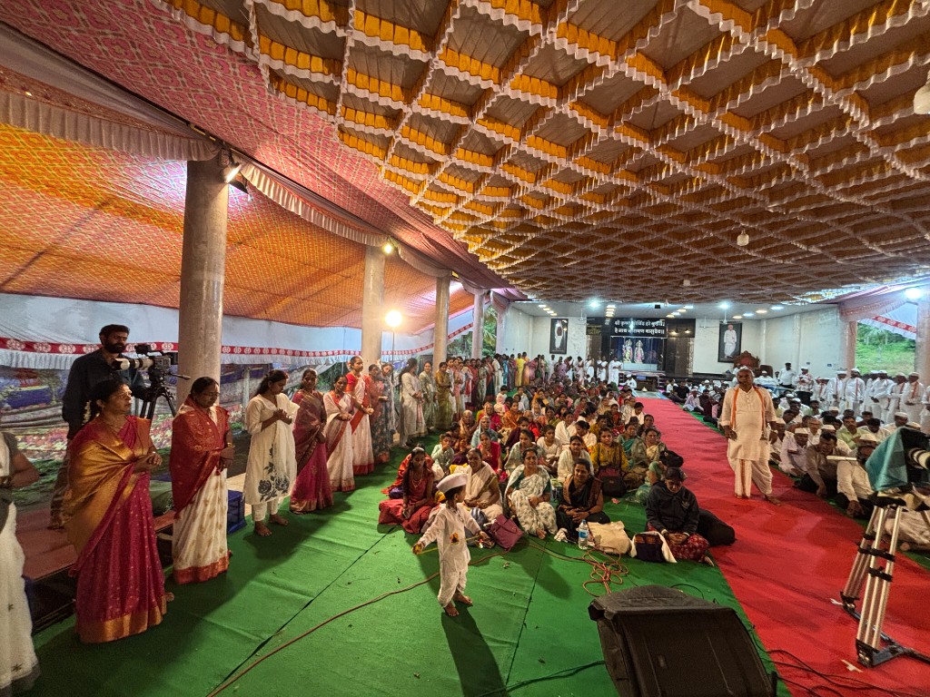 Punyatithi Utsav gathering at the decorated pavilion